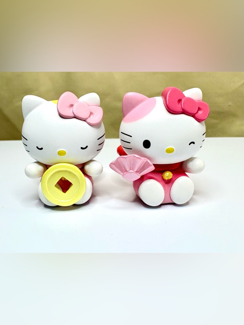 Two Hello Kitty Mini Figurine Rings from the 2026 Good Fortune series!